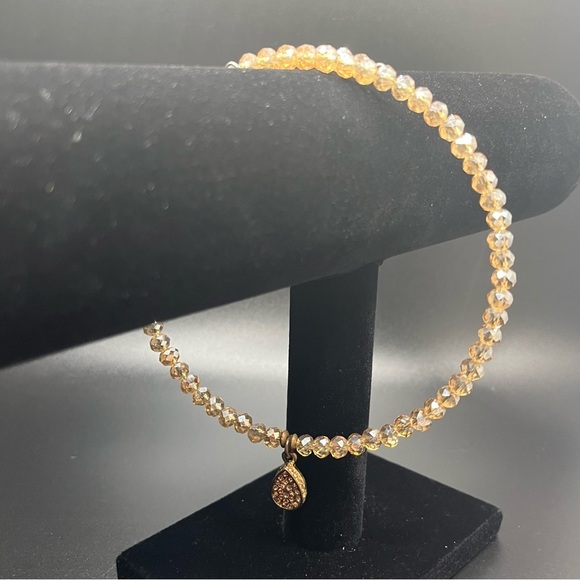 Modern light amber colored crystal choker with a teardrop rhinestone pendant. - Picture 7 of 9